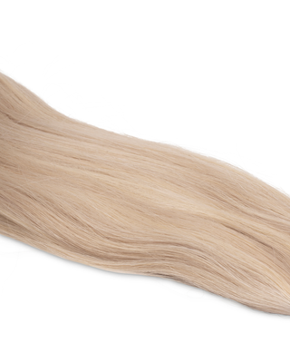 Luxurious Hairextensions Catwalk Ready onzichtbare clip-in haarextensies van 100% menselijk haar, 60cm lang.