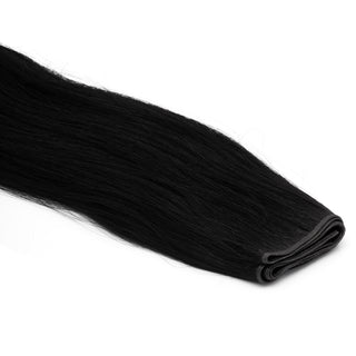 Luxurious Hairextensions Deluxe Double Weft Pro, 100% human haar, lange 50cm haarextensies zichtbaar in afbeelding.