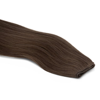 Luxurious Hairextensions Deluxe Double Weft Pro, 100% menselijk haar, lange haarextensies van 50 cm, zichtbaar in de afbeelding.