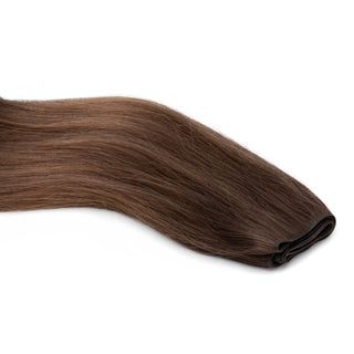 Luxurious Hairextensions Deluxe Double Weft Pro, 100% menselijk haar, lange hairextensies van 50 cm, zichtbaar in de afbeelding.