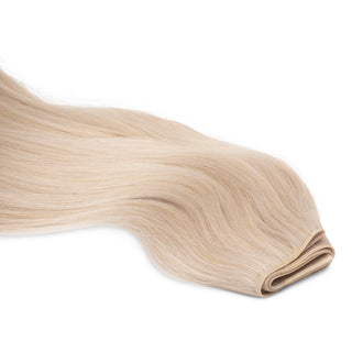 Luxurious Hairextensions Deluxe Triple Weft Pro 100% menselijk haar, lange haarextensies van 50cm op afbeelding.