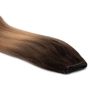 Luxueuze Luxurious Hairextensions Deluxe Triple Weft Pro van 100% menselijk haar, 50cm lang, zichtbaar in de afbeelding.