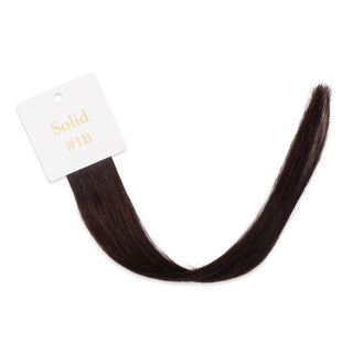Luxurious-Hairextensions shade testers voor haarextensies, close-up van verschillende kleuropties voor haarverlenging.