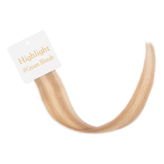 Luxurious-Hairextensions shade testers voor haarextensies, gedetailleerde close-up van verschillende haarkleuren en texturen.