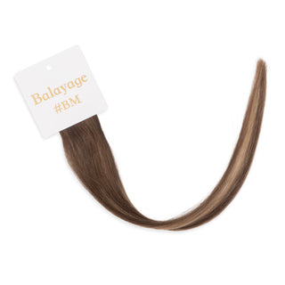 Luxurious-Hairextensions shade testers voor haarextensies, close-up van verschillende haarkleuren en texturen.