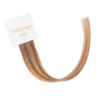 Luxurious-Hairextensions shade testers voor haarextensies, tonen verschillende haarkleuren en tinten.