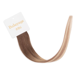 Luxurious-Hairextensions shade testers voor haarextensies, tonen verschillende haarkleuren en tinten op haarstukken