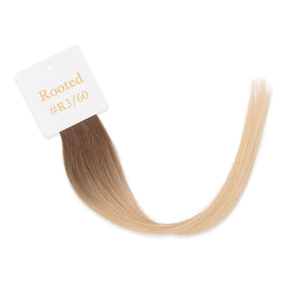 Luxurious-Hairextensions shade testers voor haarextensies, toont verschillende haarkleuren en texturen in close-up.