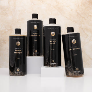 Luxurious-Hairextensions Signature Care Collection haarverzorging set van 1000 ml met fles en verzorgingsproducten.