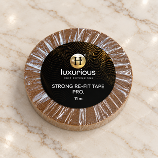 Luxurious Hairextensions Strong Re-Fit Tape Pro accessoire, getipt op een verpakking met tapepro logo en professionele details